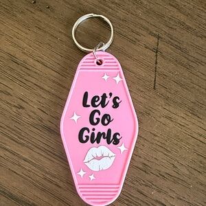 Pink Keychain with 'Let's Go Girls' Design